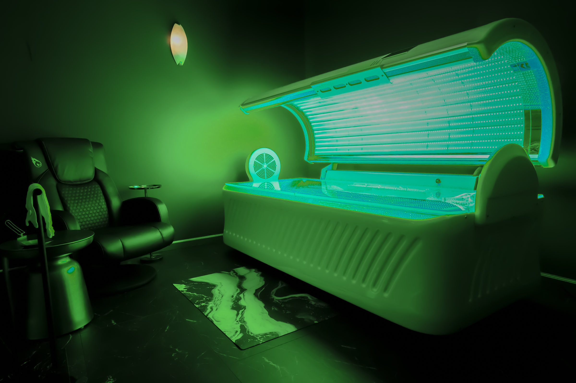 LED light therapy bed in green light mode